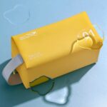 کیف لوازم آرایشی ژله ای طرح مکعب زرد ضدآب