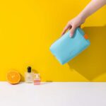 کیف آرایشی چرم رنگی آبی پاستیلی نمای دور