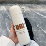 فلاسک کاپ دار برند HSCUP رنگ کرم نمای رو به رو